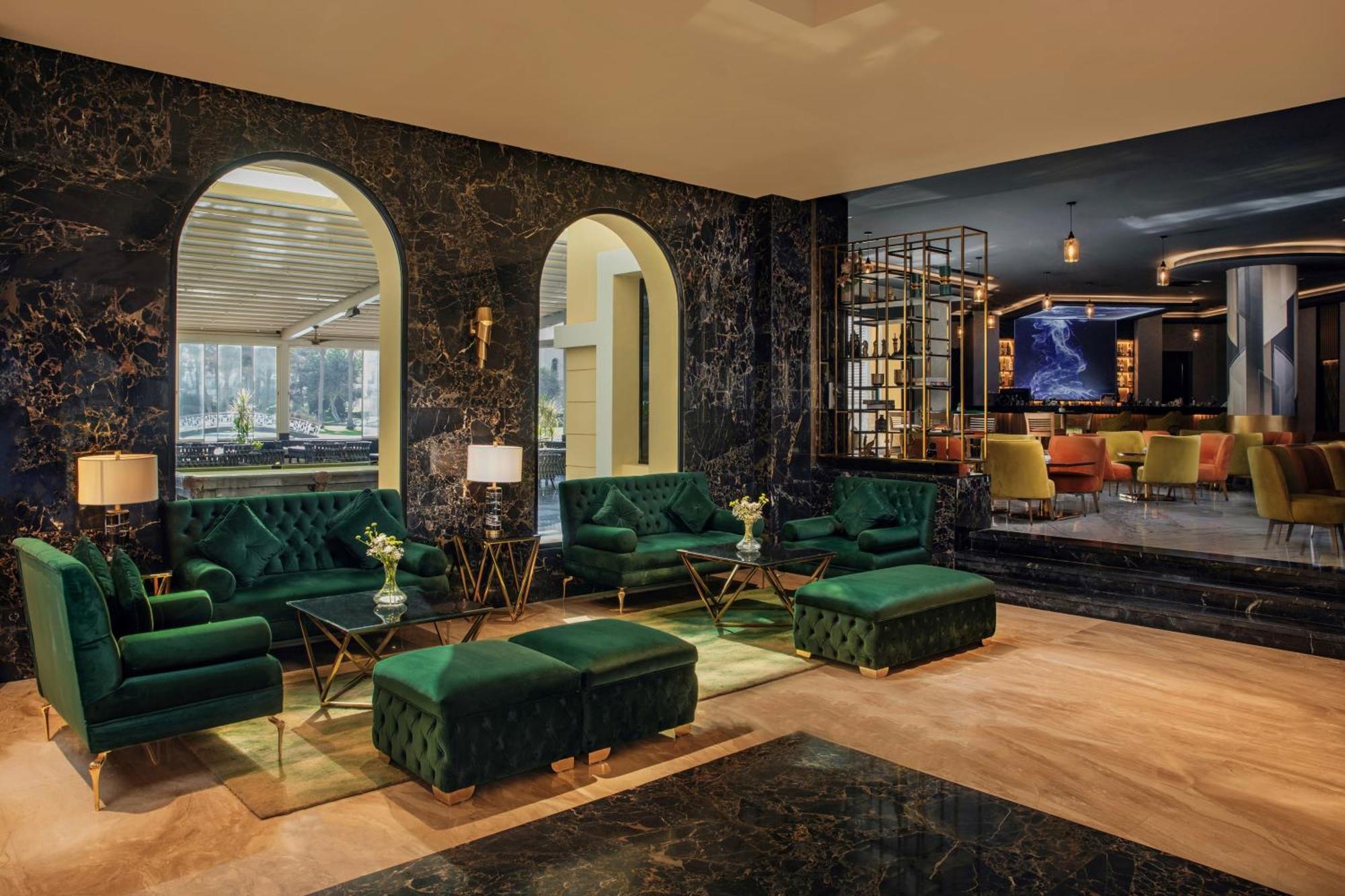 Moevenpick Hotel Cairo - Media City Giza Экстерьер фото The lounge at the airport